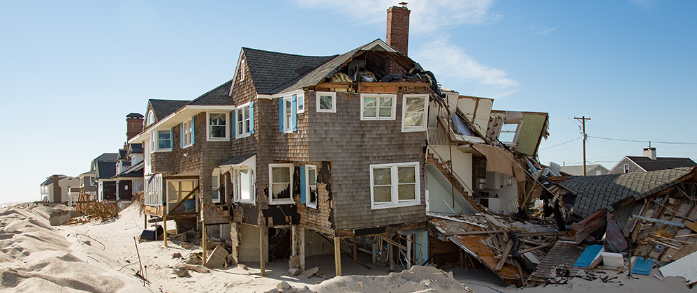 Hurricane damaged home on beach